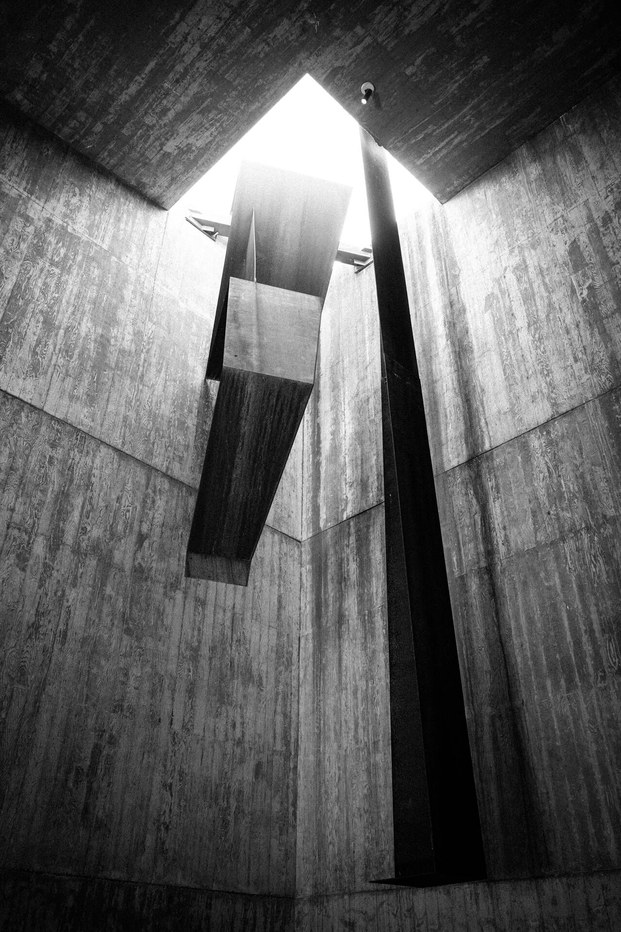 Modern concrete architecture with a dramatic skylight